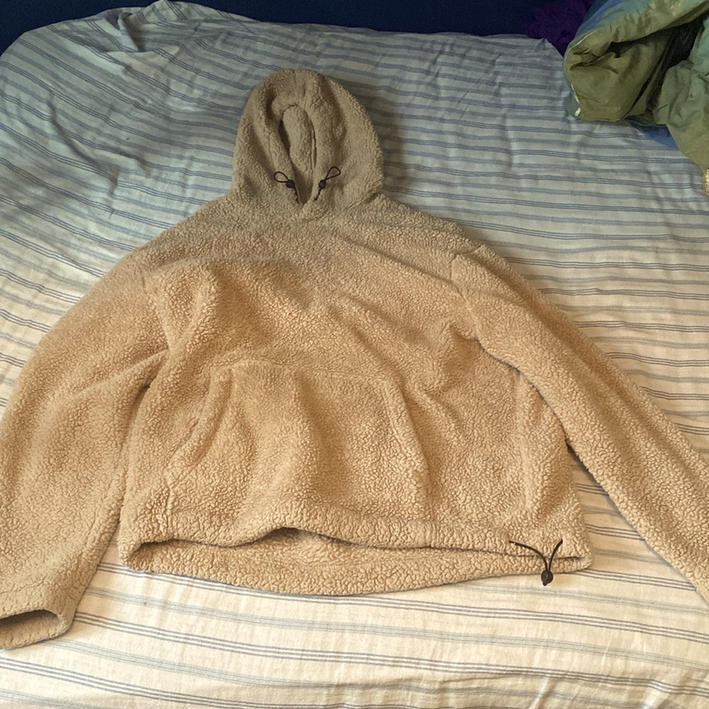 Fur coat with adjustable hoodie/waist
